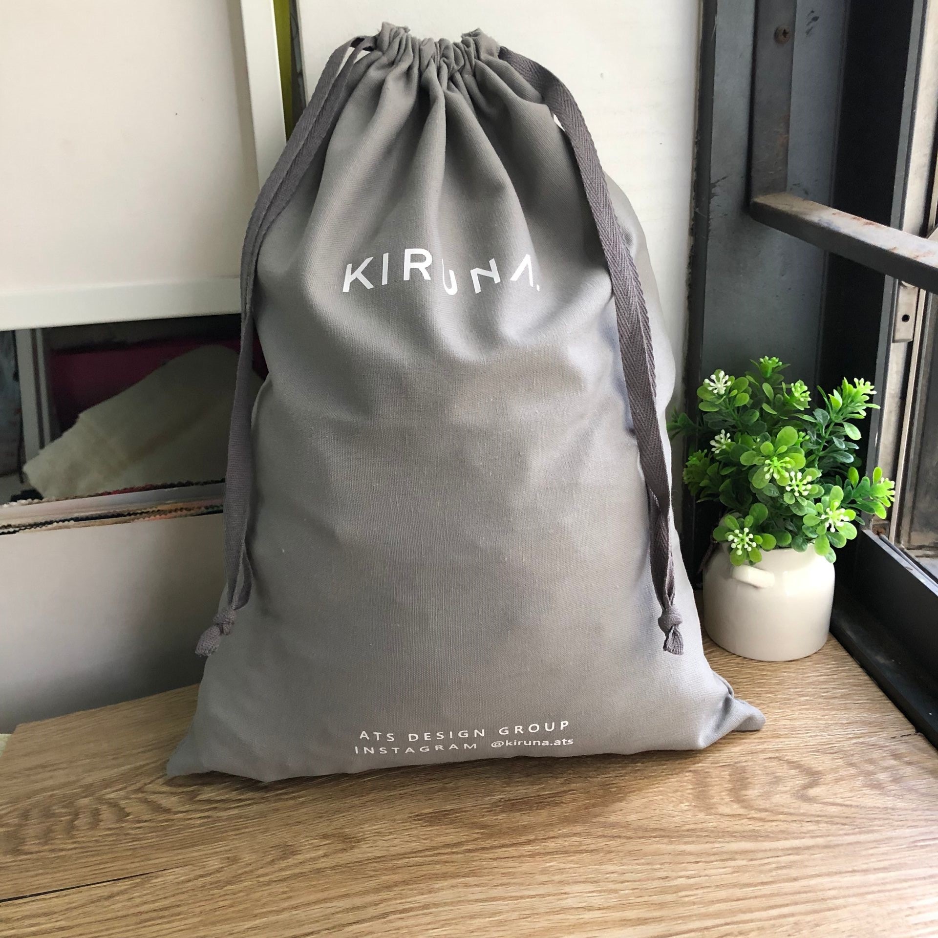 Natural muslin gift pouch with custom logo for small product packaging