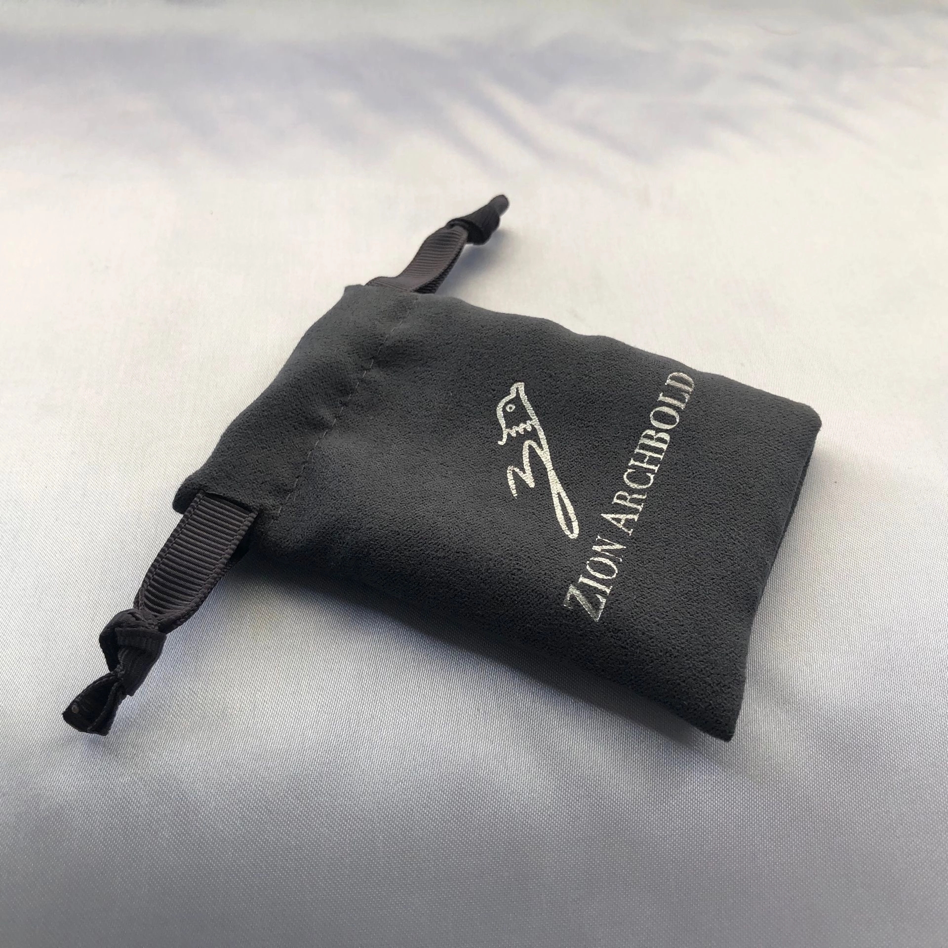 Premium jewelry gift pouch with custom logo for boutique packaging