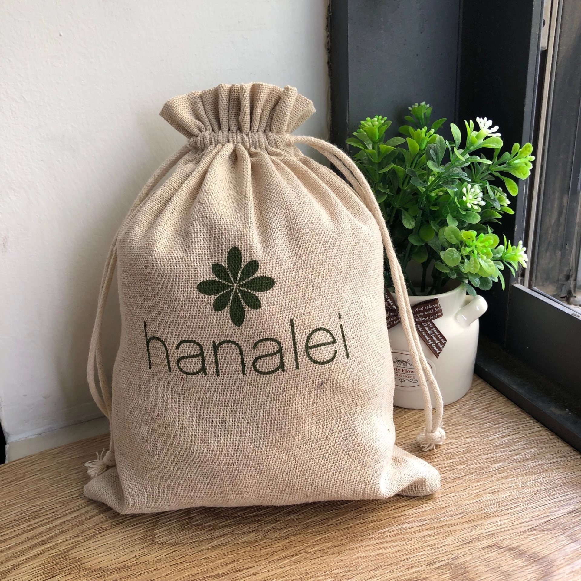 Custom jute drawstring bag with logo for eco friendly packaging
