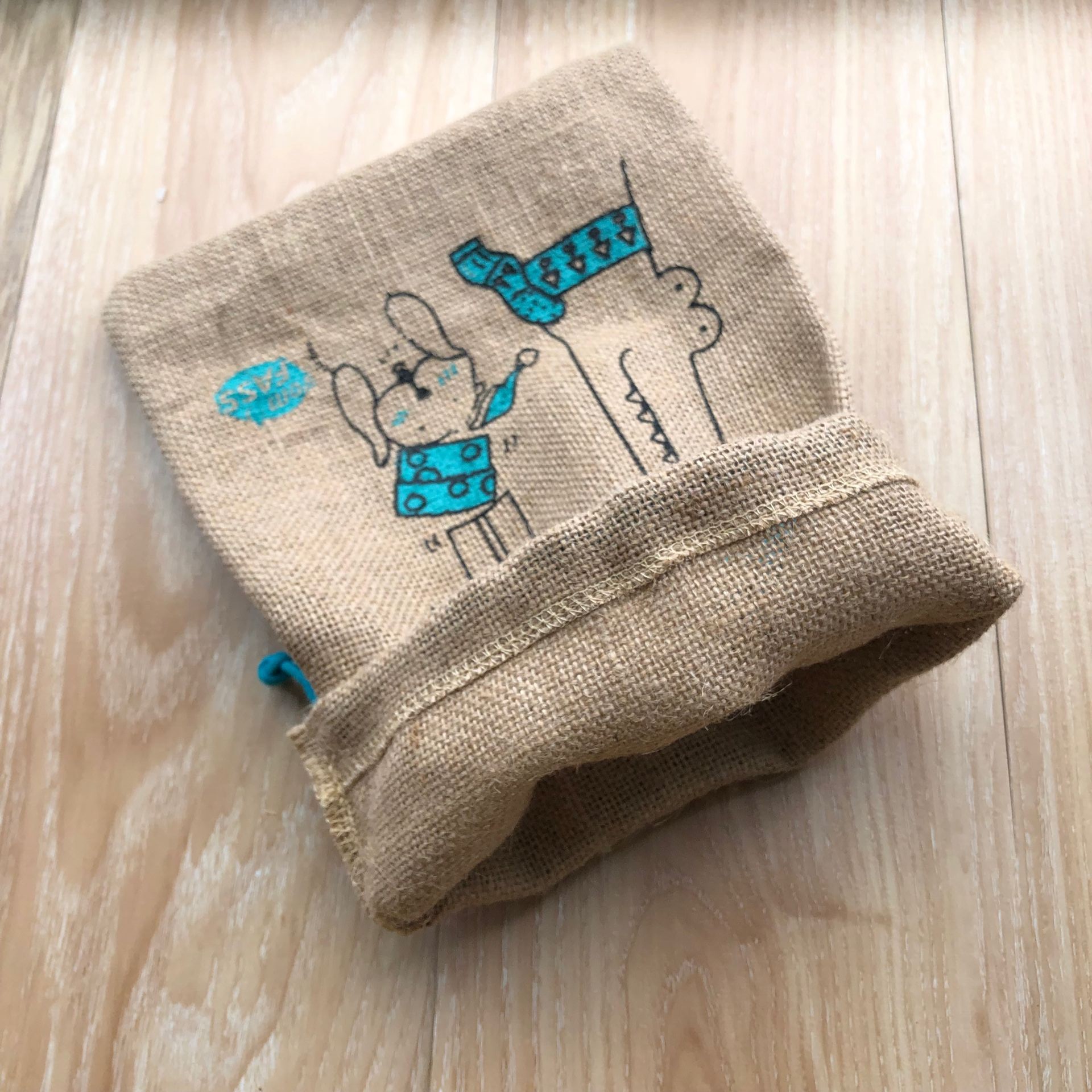 Burlap gift pouch with custom logo for natural product packaging